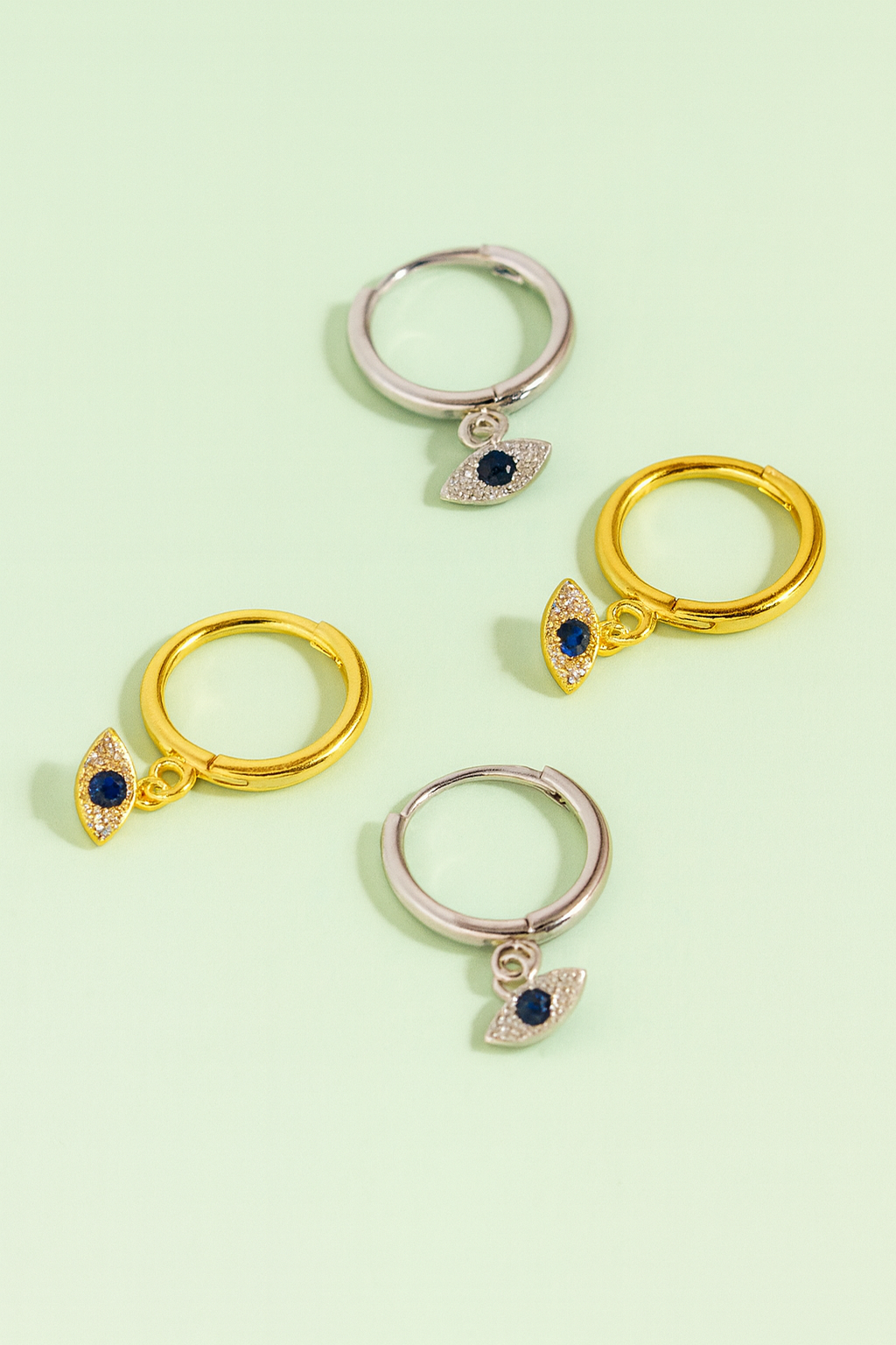 Gold / Silver eye hoop huggies